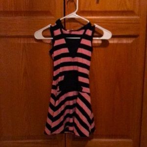 Justice tunic with hood and front pocket. Pink and black stripped. Size 6.